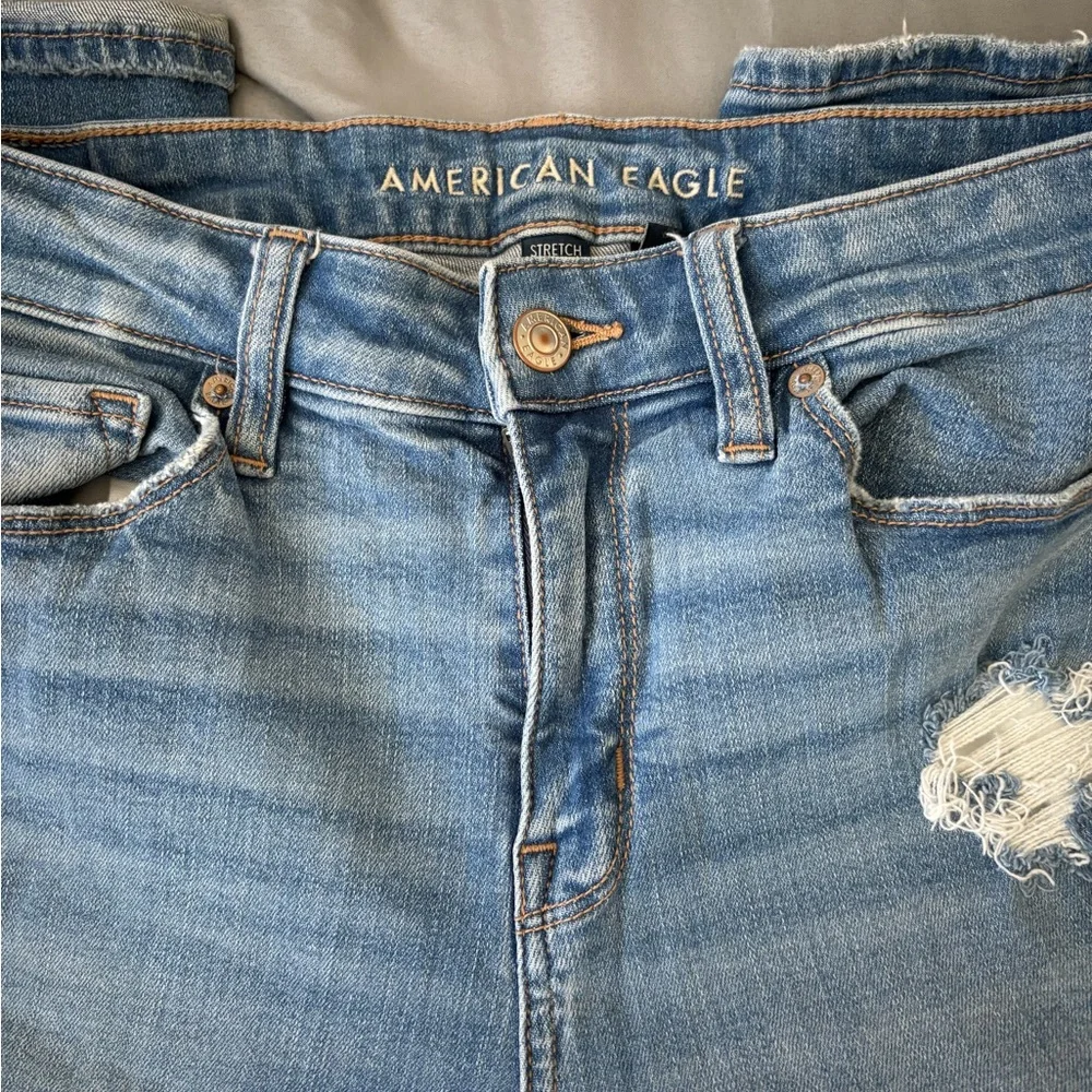 American Eagle Outfitters Light Blue Ripped Skinny Jeans - Picture 2 of 7